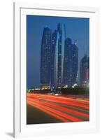 Emirate Towers and Car Tail Lights at Night, Abu Dhabi, United Arab Emirates, Middle East-Frank Fell-Framed Photographic Print