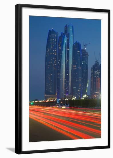 Emirate Towers and Car Tail Lights at Night, Abu Dhabi, United Arab Emirates, Middle East-Frank Fell-Framed Photographic Print