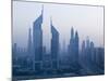 Emirates Towers, Sheik Zayed Road Area, Dubai, United Arab Emirates-Walter Bibikow-Mounted Photographic Print