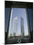 Emirates Towers Through Dubai International Financial Center Arch, Sheikh Zayed Road, Dubai, UAE-Walter Bibikow-Mounted Photographic Print