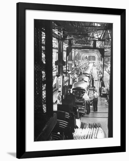 Employees Working on Cars as They Move Down Assembly Line-Ralph Morse-Framed Photographic Print