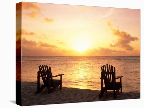 Empty Beach Chairs at Sunset, Denis Island, Seychelles-Sergio Pitamitz-Stretched Canvas