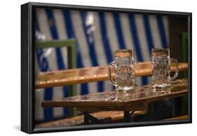 empty beer mugs in the rain, Oktoberfest-Christine Meder stage-art.de-Framed Photographic Print