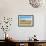 Empty bench amid wildflowers on the shingle beach at Pevensey Bay, East Sussex-Barry Davis-Framed Photographic Print displayed on a wall