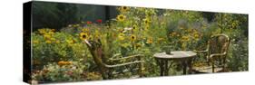 Empty Chairs and a Table in a Garden, Taos, New Mexico, USA-null-Stretched Canvas