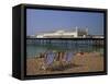 Empty Deck Chairs on the Beach and the Brighton Pier, Brighton, Sussex, England, United Kingdom-Miller John-Framed Stretched Canvas