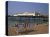 Empty Deck Chairs on the Beach and the Brighton Pier, Brighton, Sussex, England, United Kingdom-Miller John-Stretched Canvas