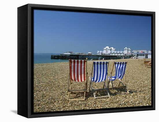 Empty Deck Chairs on the Beach and the Southsea Pier, Southsea, Hampshire, England, United Kingdom-Nigel Francis-Framed Stretched Canvas