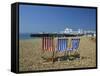 Empty Deck Chairs on the Beach and the Southsea Pier, Southsea, Hampshire, England, United Kingdom-Nigel Francis-Framed Stretched Canvas