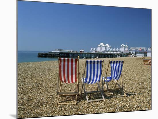 Empty Deck Chairs on the Beach and the Southsea Pier, Southsea, Hampshire, England, United Kingdom-Nigel Francis-Mounted Photographic Print