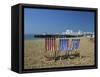 Empty Deck Chairs on the Beach and the Southsea Pier, Southsea, Hampshire, England, United Kingdom-Nigel Francis-Framed Stretched Canvas
