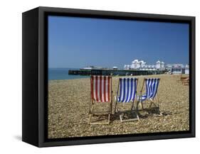 Empty Deck Chairs on the Beach and the Southsea Pier, Southsea, Hampshire, England, United Kingdom-Nigel Francis-Framed Stretched Canvas