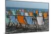 Empty Deckchairs on Pebble Beach in Devon, England, UK-Natalie Tepper-Mounted Photo