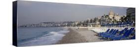 Empty Lounge Chairs on the Beach, Nice, French Riviera, France-null-Stretched Canvas