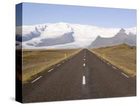Empty Road Leading Towards Fjallsjokull Glacier Near Jokulsarlon, Iceland, Polar Regions-Gavin Hellier-Stretched Canvas