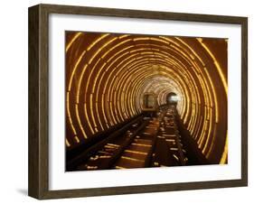 Empty Tourist Subway Car Runs Through Illuminated Tunnel in Shanghai, China-null-Framed Photographic Print