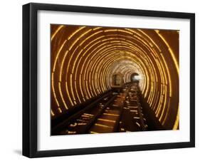 Empty Tourist Subway Car Runs Through Illuminated Tunnel in Shanghai, China-null-Framed Photographic Print