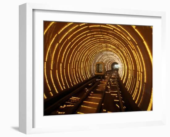 Empty Tourist Subway Car Runs Through Illuminated Tunnel in Shanghai, China-null-Framed Photographic Print