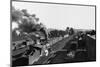 Engine Moving Through a Rail Yard-null-Mounted Photographic Print