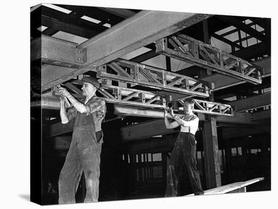 Engineers Lifting Steelwork into Position, South Yorkshire, 1954-Michael Walters-Stretched Canvas