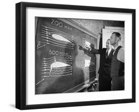 Engineers Studying Testing Results at the Langley Air Base Field-Carl Mydans-Framed Photographic Print