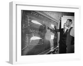 Engineers Studying Testing Results at the Langley Air Base Field-Carl Mydans-Framed Photographic Print