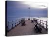 England, Dorset, Swanage; Sunrise from the Banjo Jetty at Swanage, with the Isle of Wight-Katie Garrod-Stretched Canvas