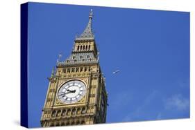 England, London, Big Ben, Aeroplane Flying in Blue Sky in Background-Michael Blann-Stretched Canvas