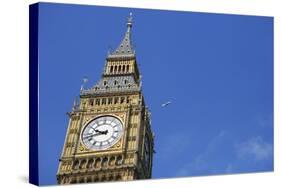 England, London, Big Ben, Aeroplane Flying in Blue Sky in Background-Michael Blann-Stretched Canvas