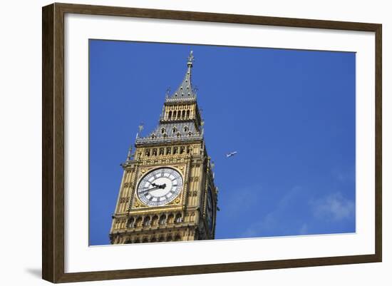 England, London, Big Ben, Aeroplane Flying in Blue Sky in Background-Michael Blann-Framed Photographic Print