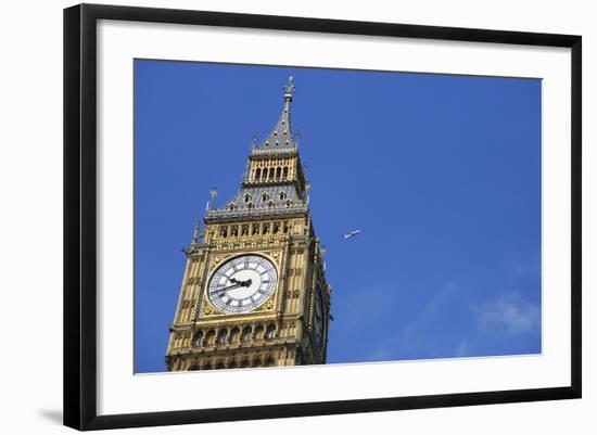 England, London, Big Ben, Aeroplane Flying in Blue Sky in Background-Michael Blann-Framed Photographic Print