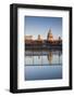 England, London, Person Reflected in Puddle at Dawn-Walter Bibikow-Framed Photographic Print