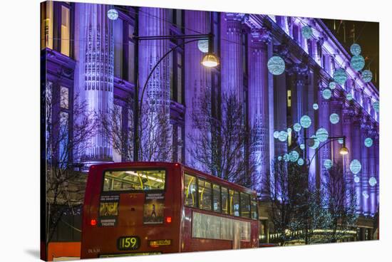 England, London, Soho, Oxford Street, Christmas Decorations and Bus-Walter Bibikow-Stretched Canvas