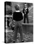 English Boy Using Reflection in Mirror in Foyer of Grand Hotel to Fix His Tie-Alfred Eisenstaedt-Stretched Canvas