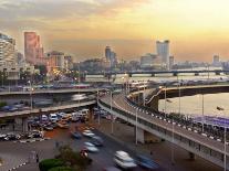 A Traffic Jam at Sunset on One of Cairo's Bridges Spanning the Nile River, Egypt, May 20, 2001-Enric Marti-Premium Photographic Print