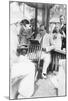 Enrico Caruso Leans Back on Chair Holding a Board with Music-null-Mounted Art Print