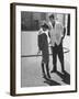 Entertainer Dean Martin Talking with Actress Pier Angeli on the Lot of a Studio-Allan Grant-Framed Premium Photographic Print