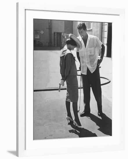 Entertainer Dean Martin Talking with Actress Pier Angeli on the Lot of a Studio-Allan Grant-Framed Premium Photographic Print