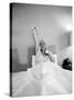 Entertainer Mae West Lifitng Barbells in Bed-Loomis Dean-Stretched Canvas