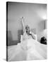 Entertainer Mae West Lifitng Barbells in Bed-Loomis Dean-Stretched Canvas