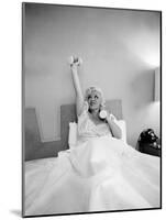 Entertainer Mae West Lifitng Barbells in Bed-Loomis Dean-Mounted Photographic Print