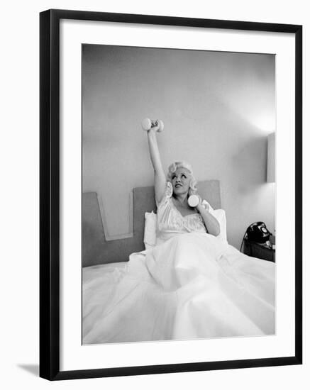 Entertainer Mae West Lifitng Barbells in Bed-Loomis Dean-Framed Photographic Print