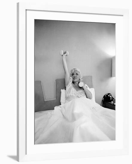 Entertainer Mae West Lifitng Barbells in Bed-Loomis Dean-Framed Photographic Print