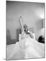 Entertainer Mae West Lifitng Barbells in Bed-Loomis Dean-Mounted Photographic Print