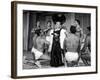 Entertainer Mae West Making Her Nightclub Debut with Loin-Clothed Dancers at Hotel Sahara-Loomis Dean-Framed Photographic Print