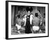 Entertainer Mae West Making Her Nightclub Debut with Loin-Clothed Dancers at Hotel Sahara-Loomis Dean-Framed Photographic Print