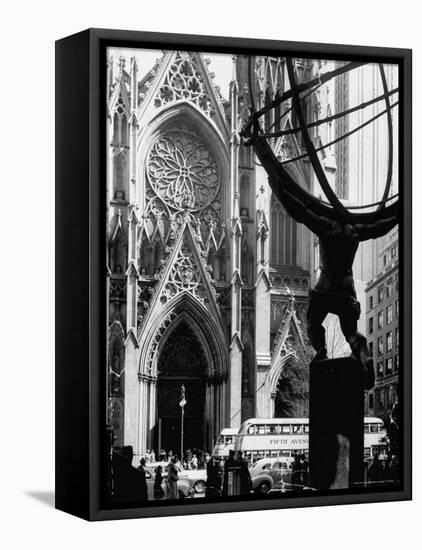 Entrance to St. Patrick's Visible Across Fifth Avenue, with Atlas Statue Silhouetted in Foreground-Andreas Feininger-Framed Stretched Canvas