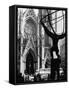 Entrance to St. Patrick's Visible Across Fifth Avenue, with Atlas Statue Silhouetted in Foreground-Andreas Feininger-Framed Stretched Canvas