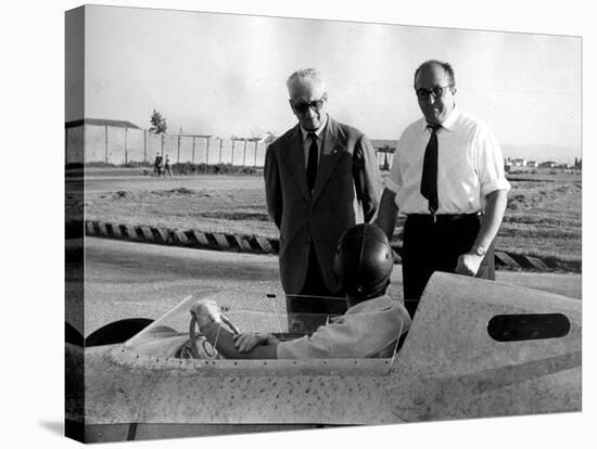 Enzo Ferrari, Carlo Chiti and Martino Severi Testing a New Racing Car-null-Stretched Canvas