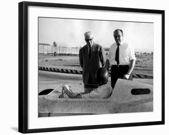 Enzo Ferrari, Carlo Chiti and Martino Severi Testing a New Racing Car-null-Framed Photographic Print